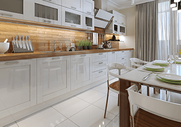White, clean kitchen with tile floors