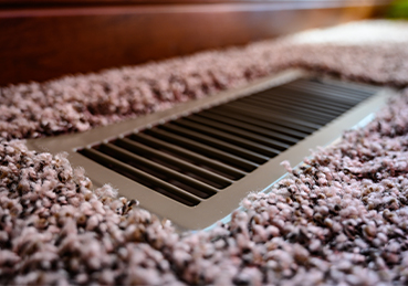 Clean vent on carpeted floor Clean vent on carpeted floor